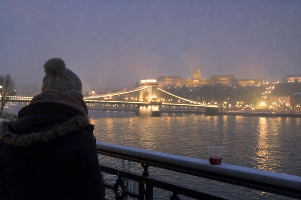 Winter evening cruise with illuminated Chain Bridge and Buda Castle, no text, no logos, no people