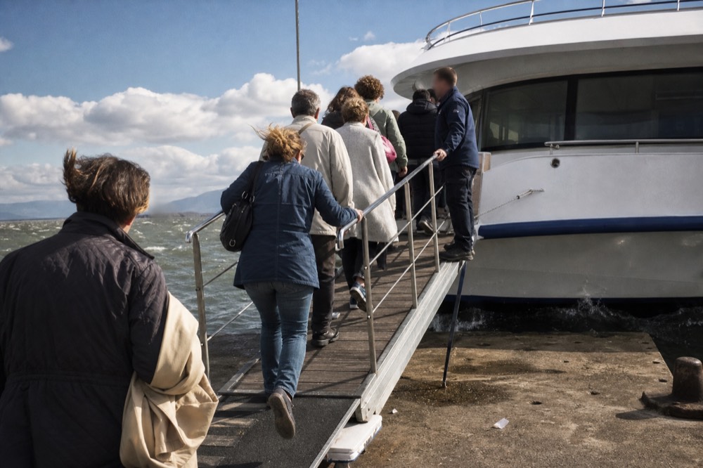 Passengers boarding a river cruise boat at a Danube dock in Budapest, no text, no logos, no people